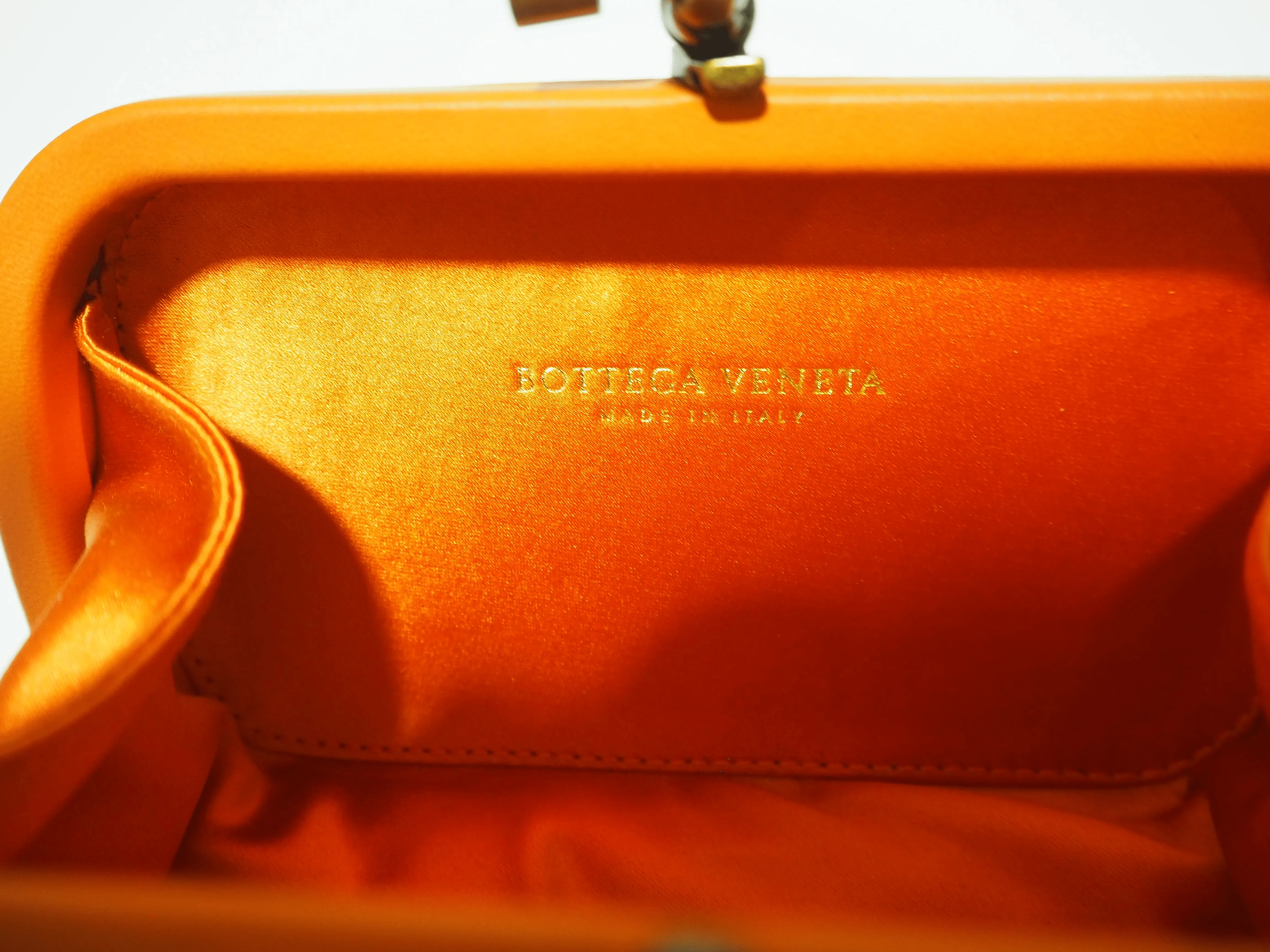 Bottega Veneta Increcciato Knot Clutch Satin Orange --