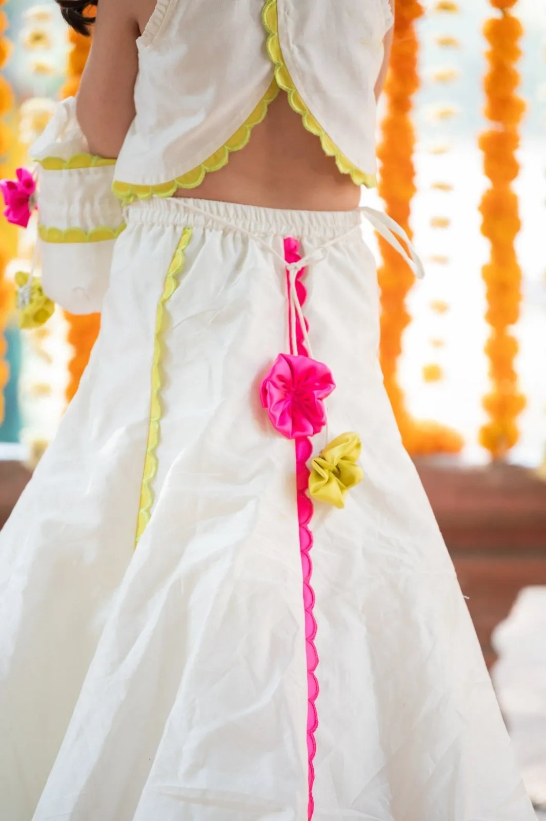 Exquisite Floral Embroidered Top And Lehenga With Potli Bag