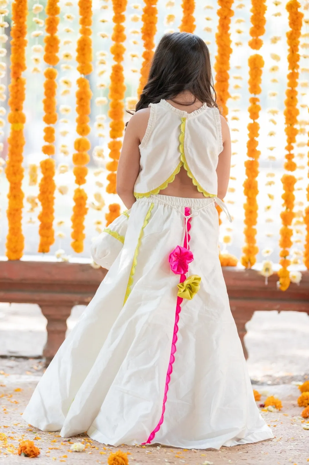 Exquisite Floral Embroidered Top And Lehenga With Potli Bag