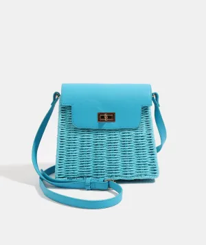 Pale Turquoise Straw Bag with Gold Closures and a Long Adjustable Strap